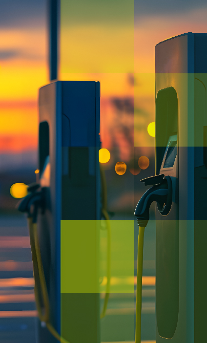 Electric vehicle charging stations at sunset, symbolizing ZEEKR’s international expansion supported by Hogan Lovells’ cross-border legal guidance