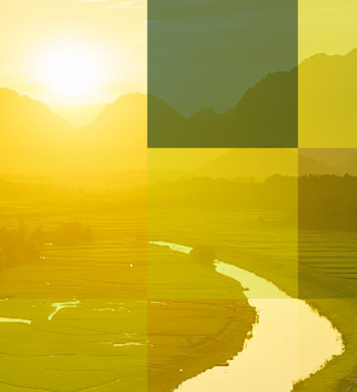  Sunrise over winding river and agricultural fields – Hogan Lovells Helion case study on renewable energy and sustainable investment.